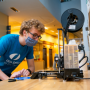 Student at a 3D printing station